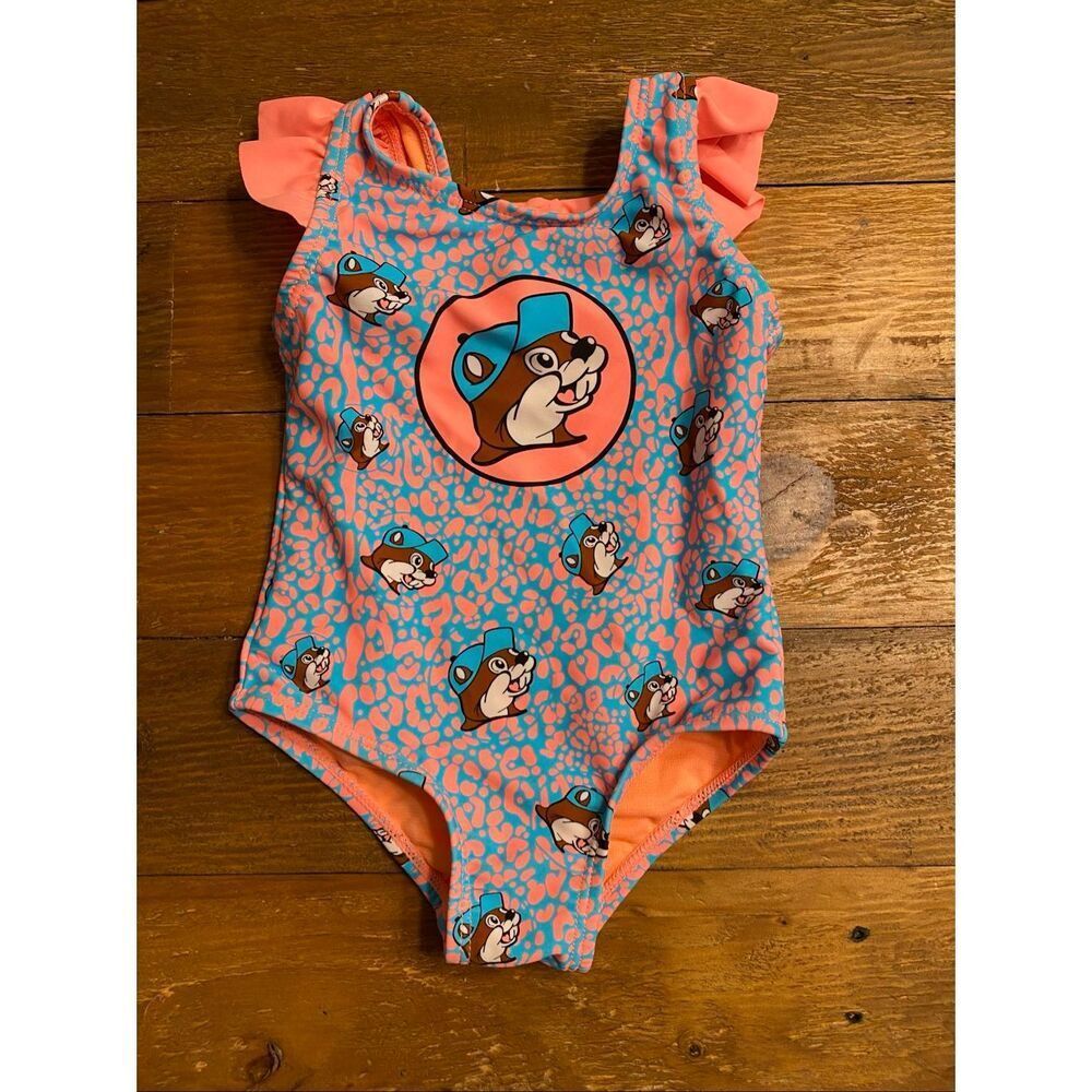 Buc-ee’s 9-12 month baby girl swimsuit one piece orange blue ruffles